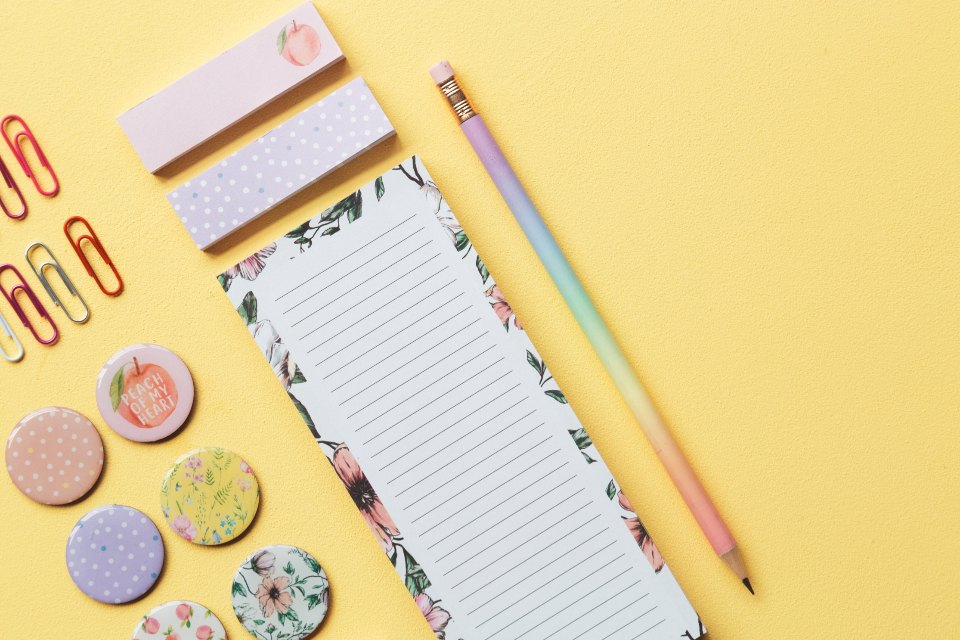 Paper and small desk objects