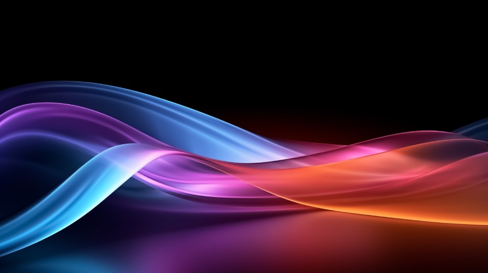Flowing colored light against a dark background
